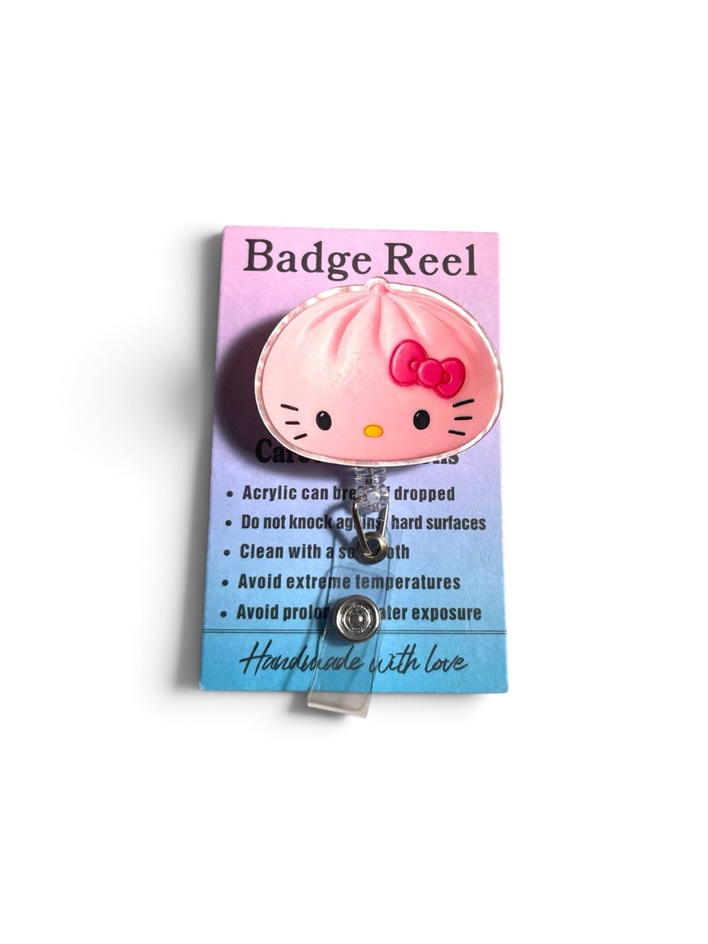 Pink Hello Kitty Style Dumpling Badge Reel